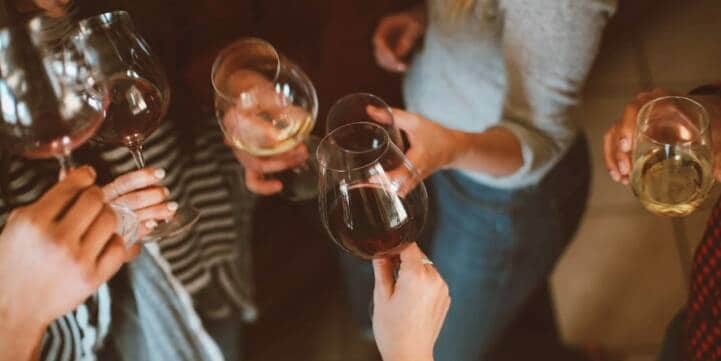 People enjoying wine together